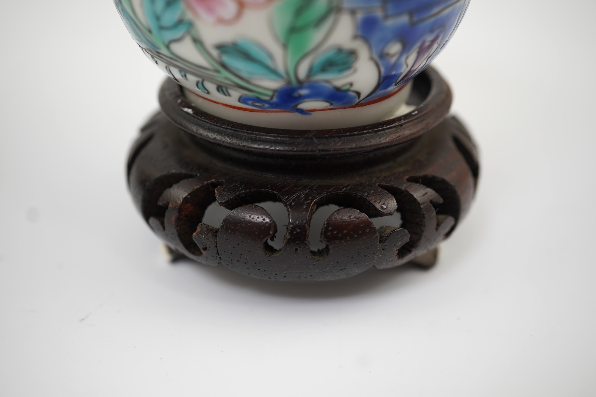 A near pair of Chinese famille rose ‘double pheasant’ coffee cups, early Qianlong period